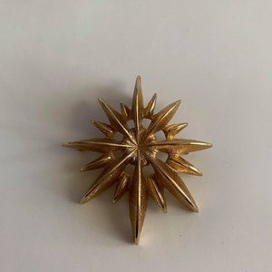 vintage Monet gold toned burst brooch